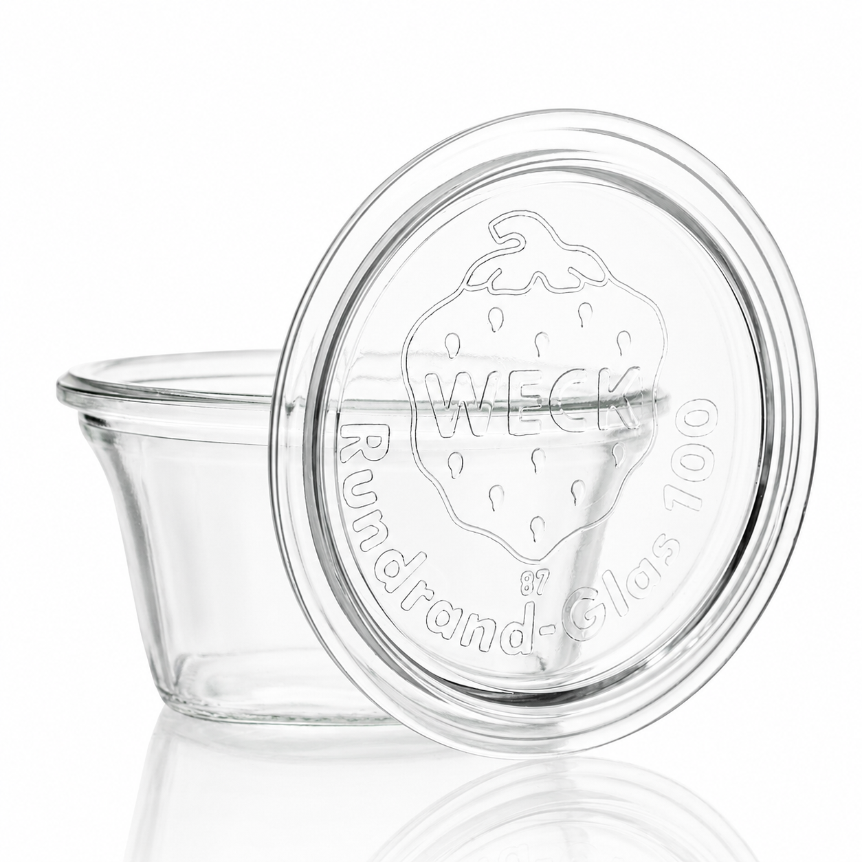 WECK-Quadro-Glas 290 ml RR100 aus Klarglas mit passendem Glasdeckel, quadratischer Grundform, Rundrandmündung und sichtbarer WECK-Prägung.