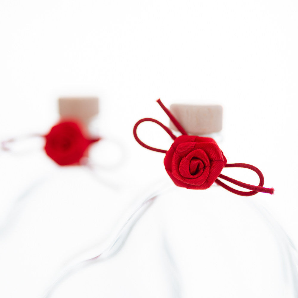 Passions-Set mit 2 Herzflaschen 100 ml und Rosenschleifen – Ansicht 2